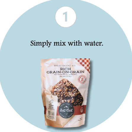 Bag of Rich Grain-on-Grain baking mix with text 'Simply mix with water' on a light blue background